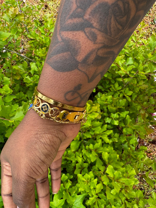 Gold LV bangle (middle piece)